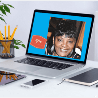 Laptop on desk with an image of Ethel Washington